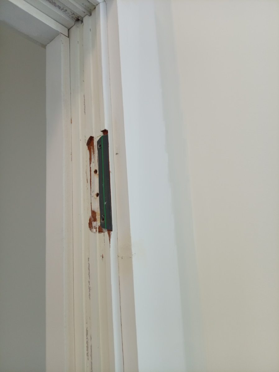 Door and frame installation in progress